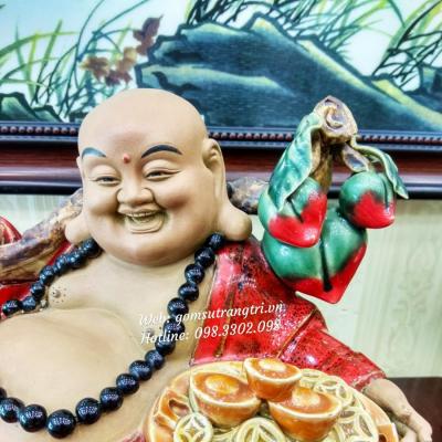Tượng Phật Di Lặc vác cành đào